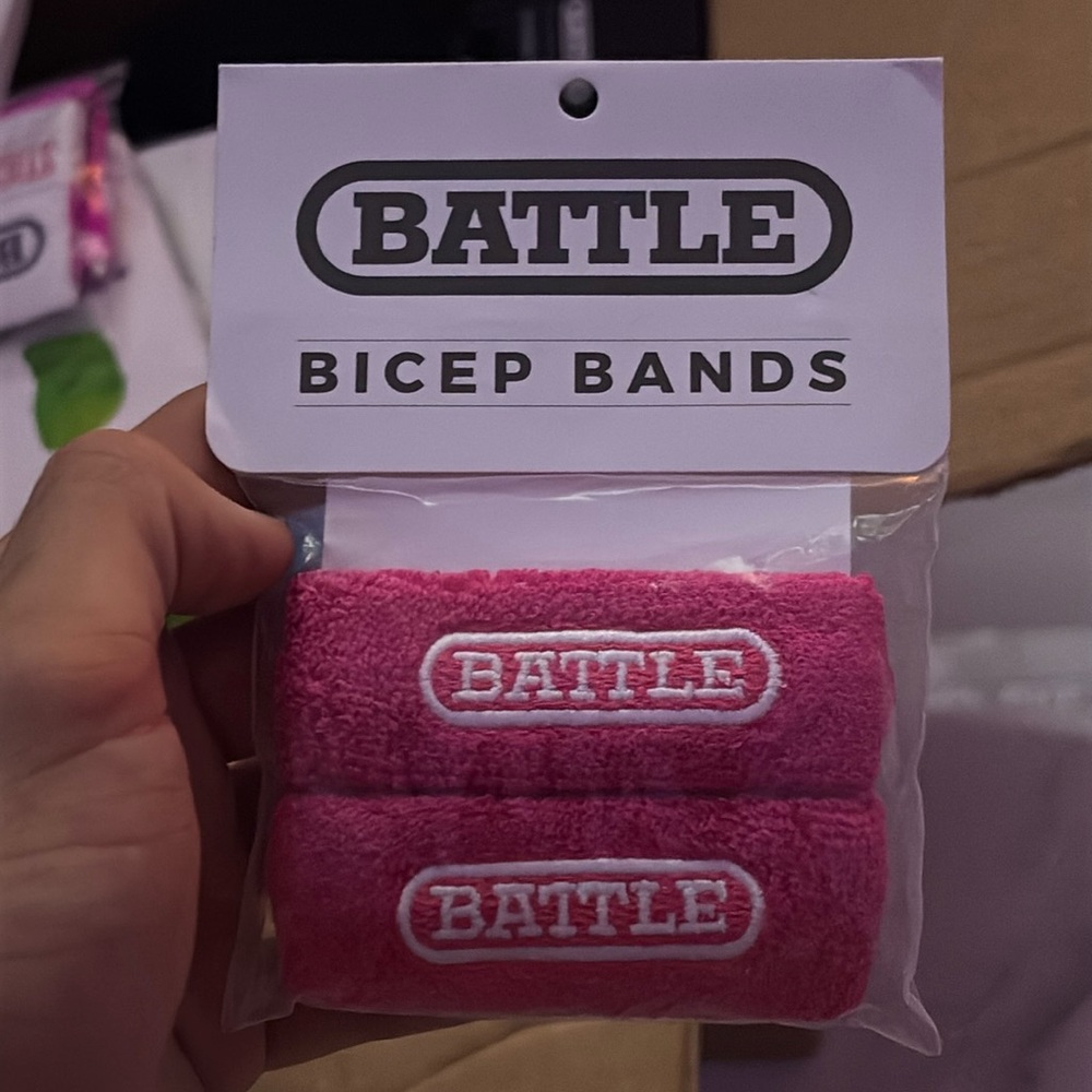 Pink BATTLE sports bicep bands for football players